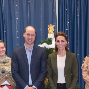 Le prince William et Catherine (Kate) Middleton se rendent sur la base militaire de la Royal Air Force (RAF) d'Akrotiri, à Chypre, pour rencontrer les soldats, les familles résidant sur la base, le personnel de la station et des membres de la communauté locale. Le 5 décembre 2018.