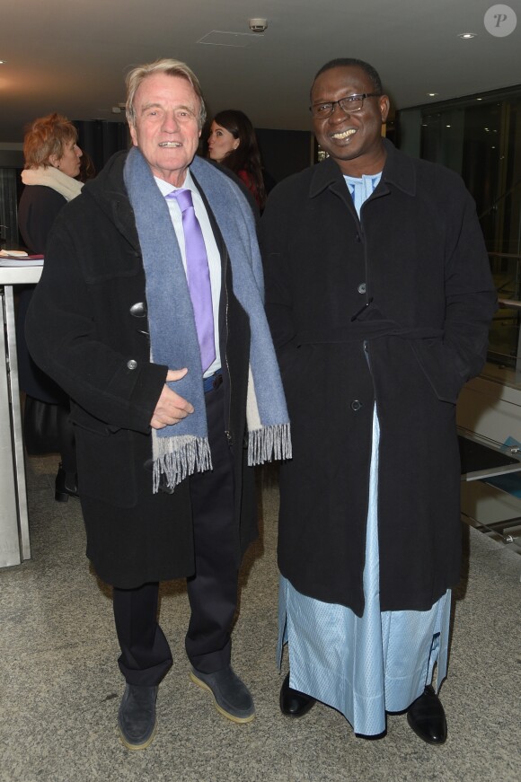 Exclusif - Bernard Kouchner et le professeur Mamadou Bocary Diarra - Dîner à la fondation Cartier au profit de La Chaîne de l'Espoir à Paris, le 14 décembre 2018. © Coadic Guirec/Bestimage