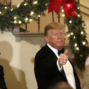 Le président Donald Trump et la première dame Melania Trump participent au bal du Congrès à la Maison Blanche à Washington le 15 décembre 2018.