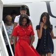 La première dame des Etats-Unis Michelle Obama, ses filles Malia et Sasha (Natasha) et sa mère Marian Robinson à leur accueil par Luigi Brugnaro et Luca Zaia lors de leur arrivée en avion à l'aéroport de Venise, le 19 juin 2015.