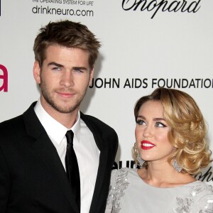 Liam Hemsworth et Miley Cyrus - Soirée pour les 20e Annual Academy Awards eu bénéfice de la fondation Elton John à West Hollywood le 26 février 2012.