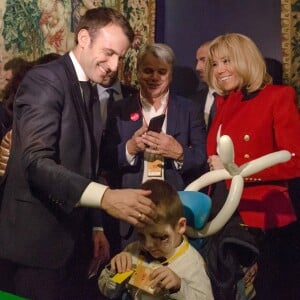 Le président de la république Emmanuel Macron et la Première Dame Brigitte Macron fêtent le Noël de l'Elysée à la Manufacture des Gobelins à Paris, le 19 décembre 2018. © Stephane Lemouton / Bestimage