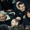 Estelle Denis et Raymond Domenech en couple au Parc des Princes à Paris le 9 janvier 2019 lors du quart de finale de la Coupe de la Ligue entre le PSG et l'En Avant Guingamp. © Cyril Moreau/Bestimage