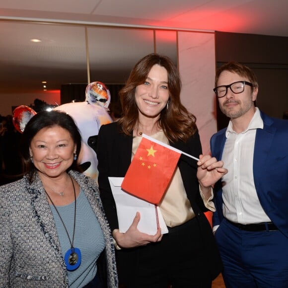 Exclusif - Jeanne d'Hauteserre, Carla Bruni-Sarkozy et l'artiste peintre Julien Marinetti - Déjeuner "Chinese Business Club" au Pavillon Gabriel à Paris, à l'occasion de la journée des droits des femmes, le 8 mars 2019 © Rachid Bellak / Bestimage