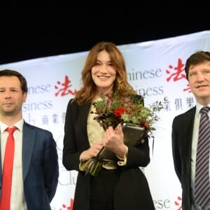 Exclusif - Carla Bruni Sarkozy (invitée d'honneur) et Harold Parisot (président du Chinese Business Club) - Déjeuner "Chinese Business Club" au Pavillon Gabriel à Paris, à l'occasion de la journée des droits des femmes, le 8 mars 2019 © Rachid Bellak / Bestimage