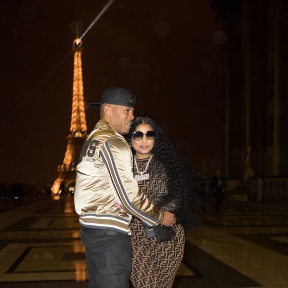 Exclusif - Nicki Minaj et son compagnon Kenneth "Zoo" Petty quittent l'hôtel Royal Monceau et vont poser en photo devant la tour Eiffel à Paris le 8 mars 2019.