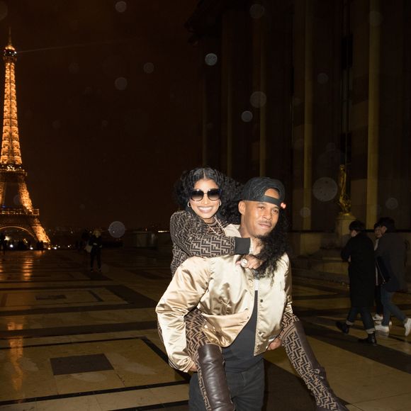 Exclusif - Nicki Minaj et son compagnon Kenneth "Zoo" Petty quittent l'hôtel Royal Monceau et vont poser en photo devant la tour Eiffel à Paris le 8 mars 2019.