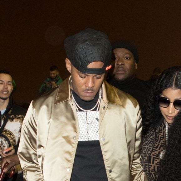 Exclusif - Nicki Minaj et son compagnon Kenneth "Zoo" Petty quittent l'hôtel Royal Monceau et vont poser en photo devant la tour Eiffel à Paris le 8 mars 2019.
