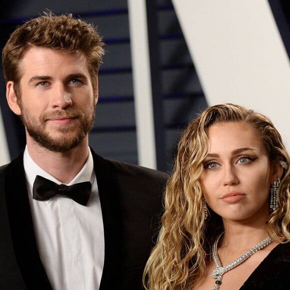 Miley Cyrus et son mari Liam Hemsworth à la soirée Vanity Fair Oscar Party à Los Angeles, le 24 février 2019.