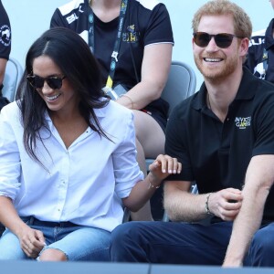 Le prince Harry et sa compagne Meghan Markle lors de leur première apparition officielle lors de la finale de tennis en chaise roulante pendant les Invictus Games 2017 à Toronto, le 25 septembre 2017.