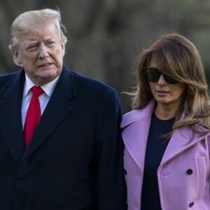 Le président Donald Trump et sa femme Melania, à la descente de Marine One, arrivent à la Maison Blanche à Washington le 31 mars 2019.