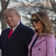 Le président Donald Trump et sa femme Melania, à la descente de Marine One, arrivent à la Maison Blanche à Washington le 31 mars 2019.
