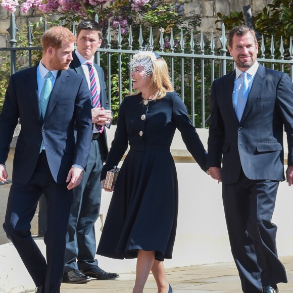Le prince Harry, duc de Sussex, Peter Phillips et Autumn Phillips arrivent pour assister à la messe de Pâques à la chapelle Saint-Georges du château de Windsor, le 21 avril 2019.