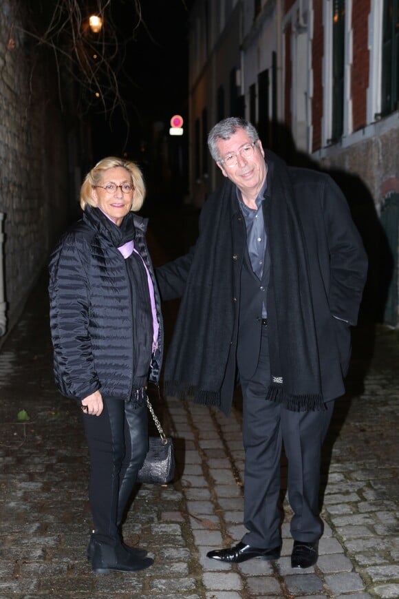 Patrick Balkany et sa femme Isabelle Balkany - Arrivées des invités à la fête d'anniversaire organisée à l'occasion des 60 ans de Nicolas Sarkozy à son domicile à Paris, le 30 janvier 2015.