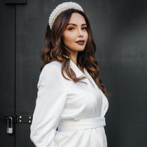 Nabilla, enceinte de 4 mois, dévoile son joli baby bump en total look blanc le 4 mai 2019.