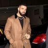 Drake arrive au Nice Guy à West Hollywood le 9 février, 2019  Canadian Singer, Drake looked sharp in a pair of black pants with a black t-shirt and wearing a smart camel colored coat with a White Gold diamond necklace as he arrived at The Nice Guy Bar in West Hollywood, CA on February 9, 2019.09/02/2019 - Los Angeles
