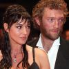 Monica Bellucci et Vincent Cassel lors de la montée des marches du film "Irréversible" au Festival de Cannes en 2002.