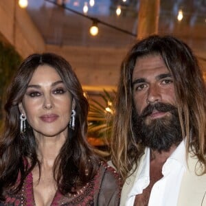 Monica Bellucci (habillée en Dior) et son compagnon Nicolas Lefebvre - People à la soirée "Dior Vogue" chez "Fred l'écailler" lors du 72ème Festival International du Film de Cannes. Le 15 mai 2019 © Olivier Borde / Bestimage