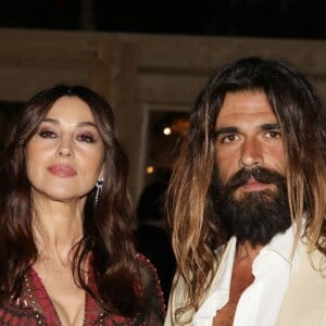 Monica Bellucci (habillée en Dior) et son compagnon Nicolas Lefebvrelors de la soirée "Dior Vogue" chez "Fred l'écailler" lors du 72ème Festival International du Film de Cannes. Le 15 mai 2019 © Denis Guignebourg / Bestimage