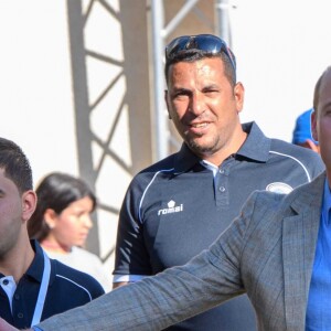 Le prince William joue au foot avec des étudiants à la "Ramallah Friends School", le 27 juin 2018.