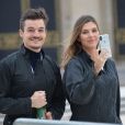 Exclusif - Camille Cerf (Miss France 2015) et son compagnon Cyrille participent à l'animation "Smash Perrier" dans la cadre des Internationaux de France de Roland-Garros 2019, à Paris, France, le 29 mai 2019. En lien avec le tournoi de Roland Garros, Perrier installe une tyrolienne sur la Tour Eiffel du 5 au 11 juin. Le Smash Perrier, c'est s'élancer depuis le deuxième étage de la Tour Eiffel et atterrir à Ecole Militaire une minute plus tard, en tyrolienne ! Comme un smash au tennis en somme, avec une vitesse moyenne de 90 km/h. © Veeren/Bestimage  (No Web pour la Belgique et la Suisse) Exclusive - Celebs participate in the animation "Smash Perrier" as part of the French Open at Roland Garros 2019. In connection with the Roland Garros tournament, Perrier installs a zip line on the Eiffel Tower from 5 to 11 June. The Smash Perrier is to start from the second floor of the Eiffel Tower and land at Ecole Militaire a minute later, zip line! Like a tennis smash, with an average speed of 90 km/h. Paris, May 29th, 2019.29/05/2019 - Paris