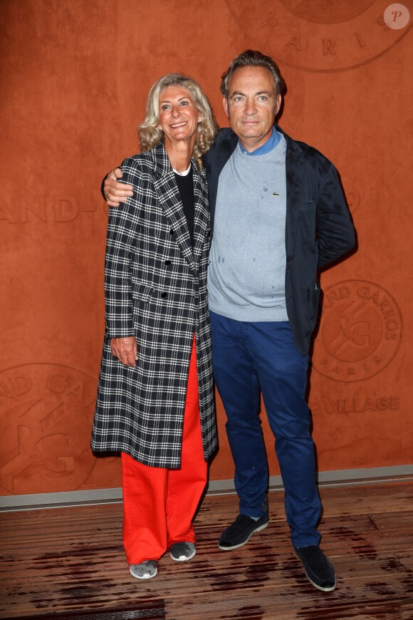 Gilles Cohen et sa compagne au village lors des internationaux de tennis de Roland Garros 2019 à Paris, France, le 5 juin 2019. © Jacovides-Moreau / Bestimage