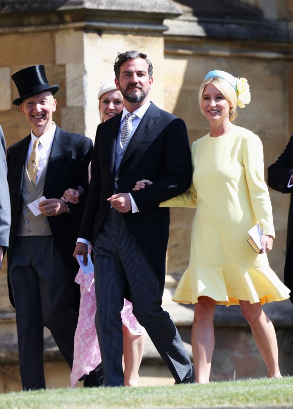 Izzy May, attachée de presse de David Beckham et ici au bras de Markus Anderson le 19 mai 2018 à Windsor lors du mariage de Meghan Markle et du prince Harry, est devenue l'une des plus proches confidentes de la duchesse de Sussex depuis son installation en Grande-Bretagne en 2017. ©Chris Jackson/PA Photos/ABACAPRESS.COM