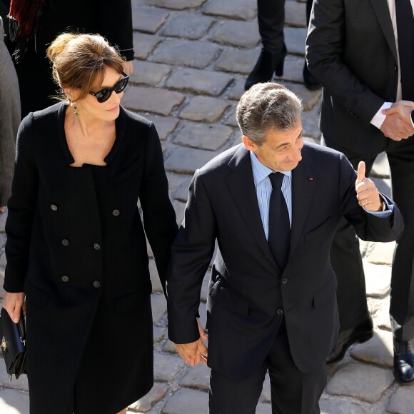 Carla Bruni Sarkozy et Nicolas Sarkozy - Arrivées à l'hommage national à Charles Aznavour à l'Hôtel des Invalides à Paris. Le 5 octobre 2018 © Jacovides-Moreau / Bestimage