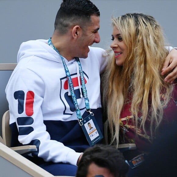 Marion Bartoli et son nouveau compagnon le joueur de football belge Yahya Boumediene s'embrassent dans les tribunes des Internationaux de France de Tennis de Roland Garros à Paris. 22 Mai 2019.