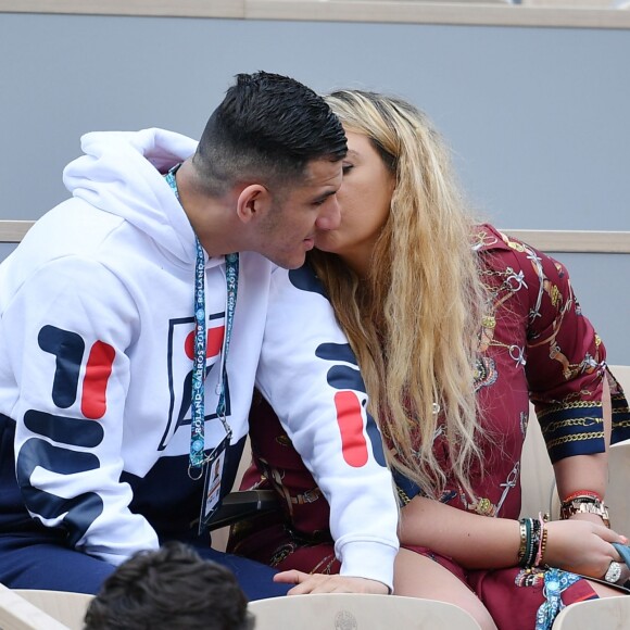 Marion Bartoli et son nouveau compagnon le joueur de football belge Yahya Boumediene s'embrassent dans les tribunes des Internationaux de France de Tennis de Roland Garros à Paris. 22 Mai 2019.