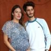 Pierre Niney et sa compagne Natasha Andrews enceinte de leur 2 ème enfant - People au village pour la finale hommes lors des internationaux de France de tennis de Roland Garros 2019 à Paris le 9 juin 2019. © Jacovides - Moreau / Bestimage