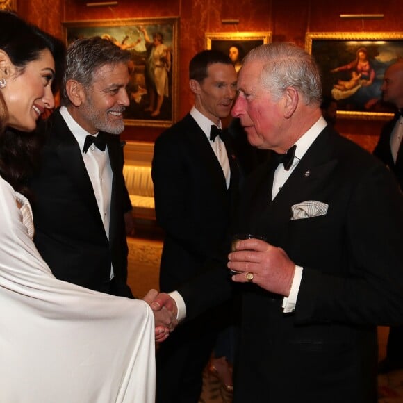 George Clooney et sa femme Amal Clooney avec le prince Charles - Dîner "The Princes Trust" au Buckingham Palace à Londres, le 12 mars 2019.