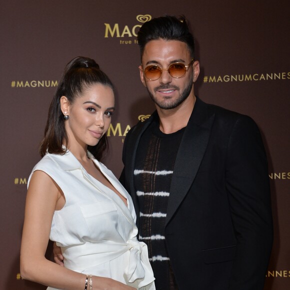 Nabilla Benattia et son mari Thomas Vergara au photocall de l'after party "Magnum x Rita Ora" sur la plage privé Magnum lors du 72e Festival International du Film de Cannes, France,le 16 mai 2019. © Veeren/Bestimage