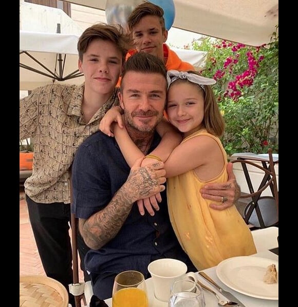 David Beckham et ses enfants Romeo, Cruz et Harper. Juin