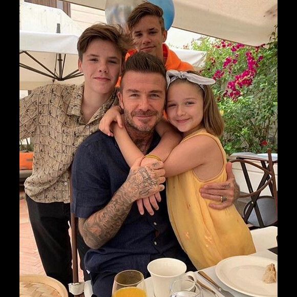 David Beckham et ses enfants Romeo, Cruz et Harper. Juin
