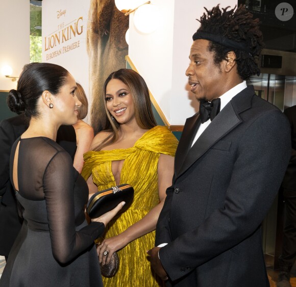 Le prince Harry, duc de Sussex, et Meghan Markle, duchesse de Sussex, avec Jay-Z et sa femme Beyonce Knowles à la première du film "Le Roi Lion" au cinéma Odeon Luxe Leicester Square à Londres, le 14 juillet 2019.