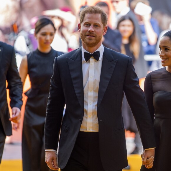 Le prince Harry, duc de Sussex, et Meghan Markle, duchesse de Sussex, à la première du film "Le Roi Lion" au cinéma Odeon Luxe Leicester Square à Londres, le 14 juillet 2019.