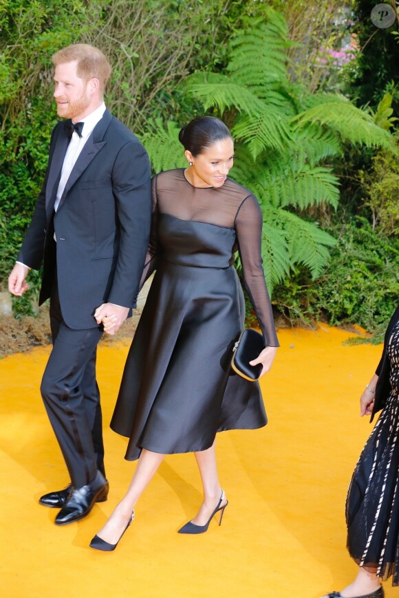 Le prince Harry, duc de Sussex, et Meghan Markle, duchesse de Sussex, à la première du film "Le Roi Lion" au cinéma Odeon Luxe Leicester Square à Londres, le 14 juillet 2019.