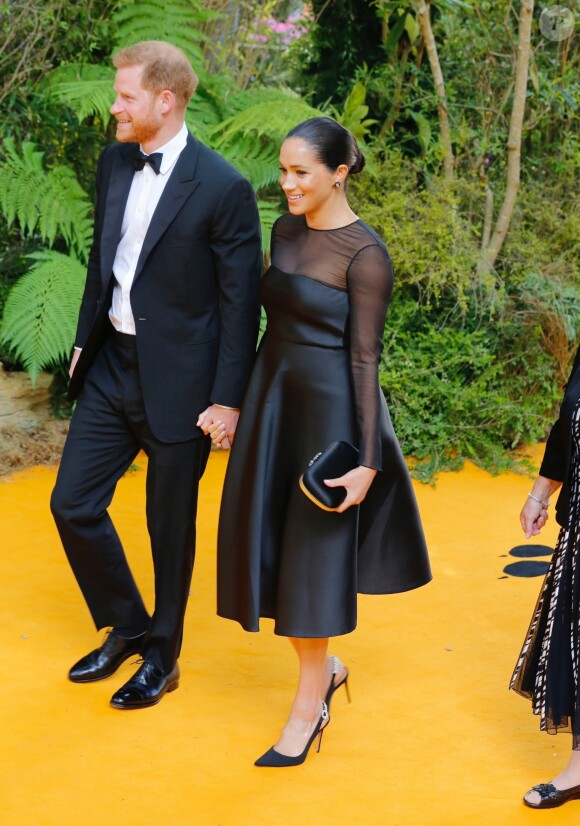 Le prince Harry, duc de Sussex, et Meghan Markle, duchesse de Sussex, à la première du film "Le Roi Lion" au cinéma Odeon Luxe Leicester Square à Londres, le 14 juillet 2019.