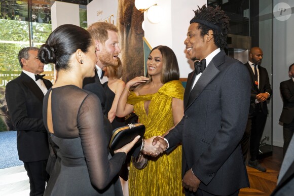 Le prince Harry, duc de Sussex, et Meghan Markle, duchesse de Sussex, avec Jay-Z et sa femme Beyonce Knowles à la première du film "Le Roi Lion" au cinéma Odeon Luxe Leicester Square à Londres, le 14 juillet 2019.