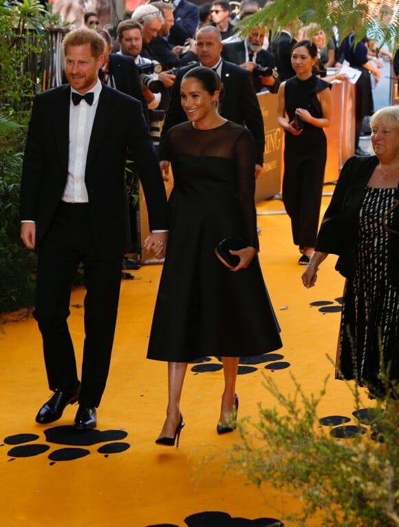 Le prince Harry, duc de Sussex, et Meghan Markle, duchesse de Sussex, à la première du film "Le Roi Lion" au cinéma Odeon Luxe Leicester Square à Londres, le 14 juillet 2019.