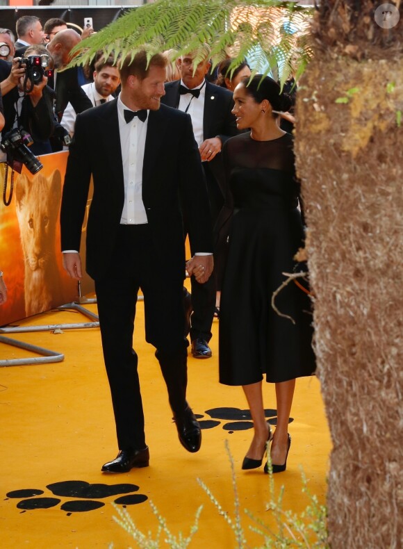 Le prince Harry, duc de Sussex, et Meghan Markle, duchesse de Sussex, à la première du film "Le Roi Lion" au cinéma Odeon Luxe Leicester Square à Londres, le 14 juillet 2019.