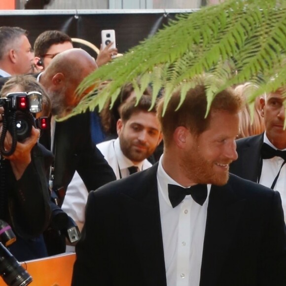 Le prince Harry, duc de Sussex, et Meghan Markle, duchesse de Sussex, à la première du film "Le Roi Lion" au cinéma Odeon Luxe Leicester Square à Londres, le 14 juillet 2019.