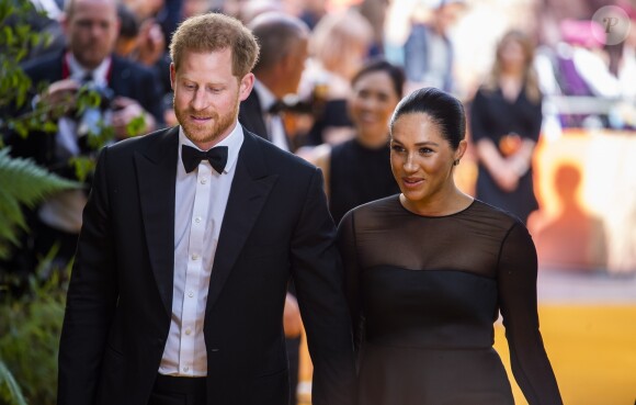 Le prince Harry, duc de Sussex, et Meghan Markle, duchesse de Sussex, à la première du film "Le Roi Lion" au cinéma Odeon Luxe Leicester Square à Londres, le 14 juillet 2019.