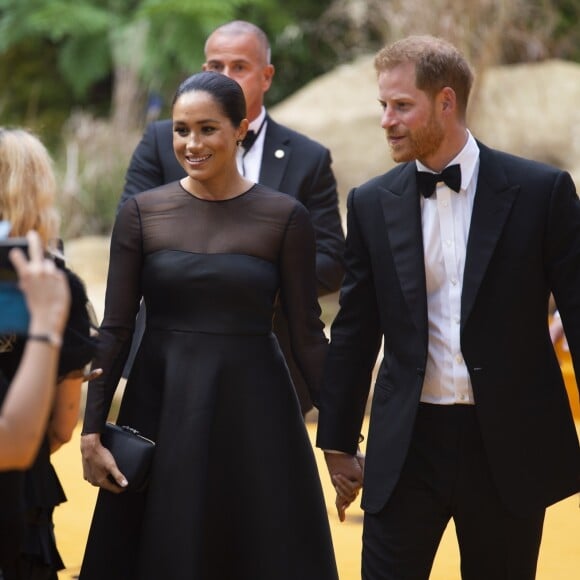 Le prince Harry, duc de Sussex, et Meghan Markle, duchesse de Sussex, à la première du film "Le Roi Lion" au cinéma Odeon Luxe Leicester Square à Londres, le 14 juillet 2019.