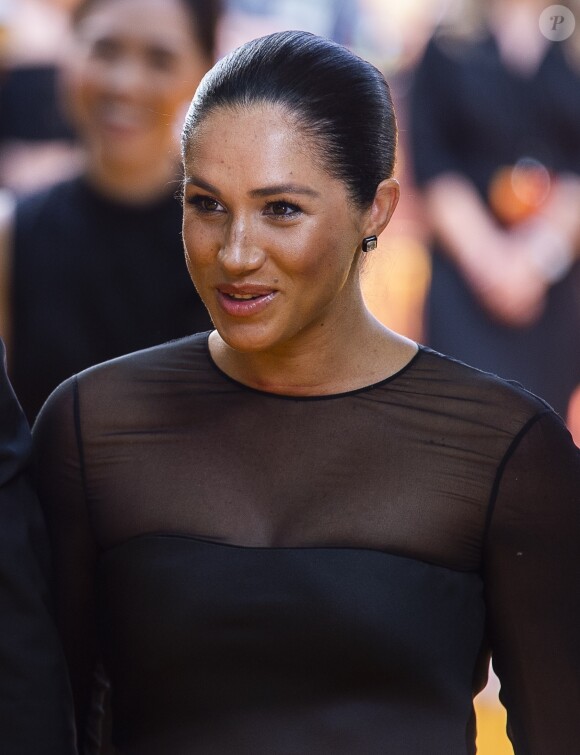 Le prince Harry, duc de Sussex, et Meghan Markle, duchesse de Sussex, à la première du film "Le Roi Lion" au cinéma Odeon Luxe Leicester Square à Londres, le 14 juillet 2019.