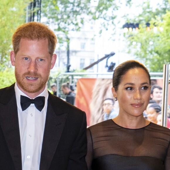 Le prince Harry, duc de Sussex, et Meghan Markle, duchesse de Sussex, à la première du film "Le Roi Lion" au cinéma Odeon Luxe Leicester Square à Londres, le 14 juillet 2019.