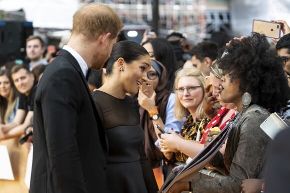 Le prince Harry, duc de Sussex, et Meghan Markle, duchesse de Sussex, à la première du film "Le Roi Lion" au cinéma Odeon Luxe Leicester Square à Londres, le 14 juillet 2019.