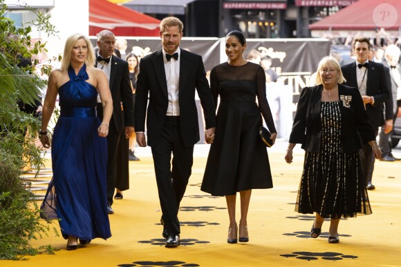 Le prince Harry, duc de Sussex, et Meghan Markle, duchesse de Sussex, à la première du film "Le Roi Lion" au cinéma Odeon Luxe Leicester Square à Londres, le 14 juillet 2019