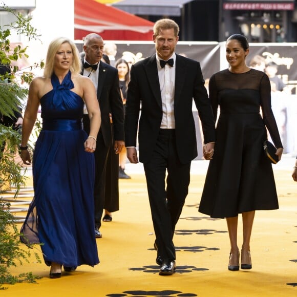 Le prince Harry, duc de Sussex, et Meghan Markle, duchesse de Sussex, à la première du film "Le Roi Lion" au cinéma Odeon Luxe Leicester Square à Londres, le 14 juillet 2019